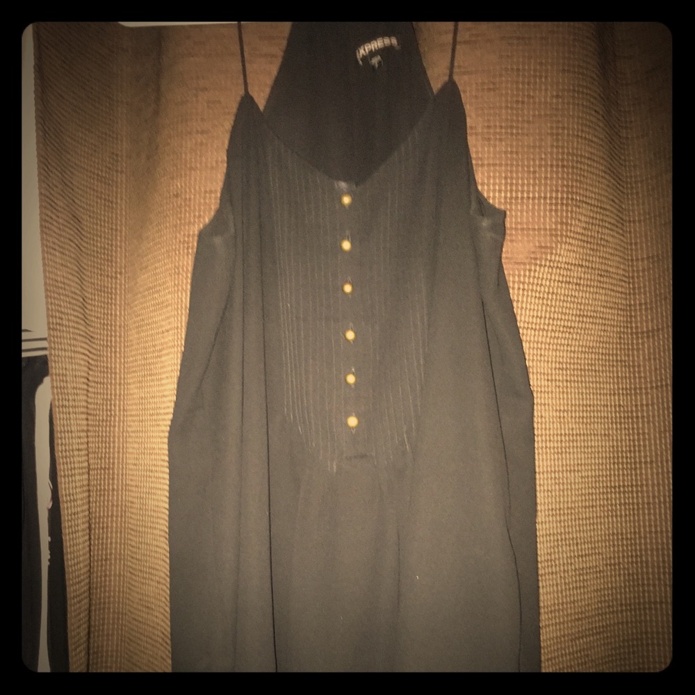 Black sleeveless top.
